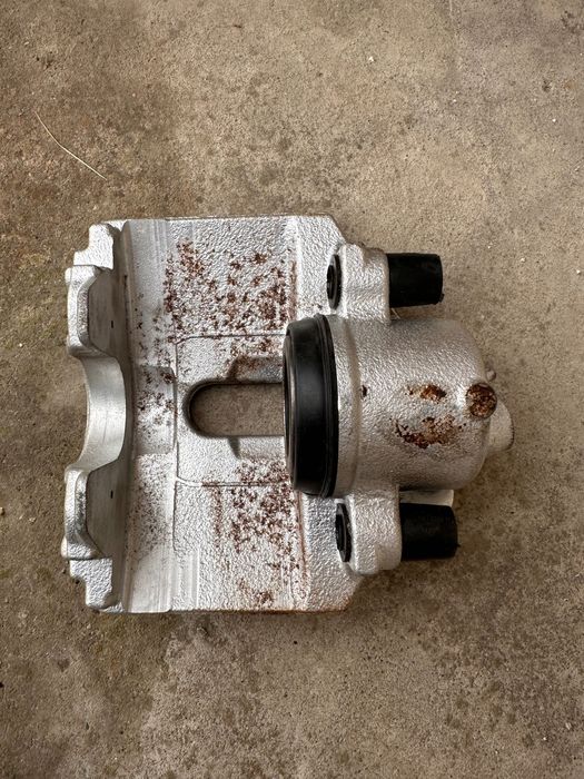 1K0615124E Суппорт передній RH Audi TT A3 A1 VW Golf Jetta B6 B7 EOS