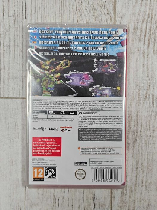 Nintendo Switch OLED Neon – idealny ekran, pudełko + gra TMNT – pełny zestaw