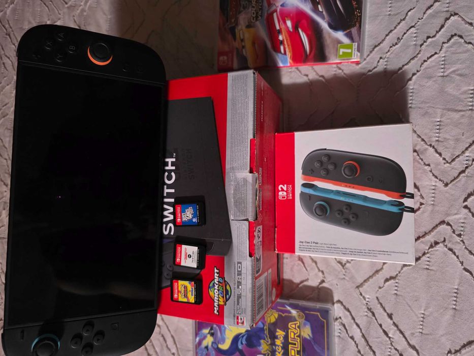 Estou a vender a minha nitendo sw 2 com mais 2 joy cons e 5 jogos