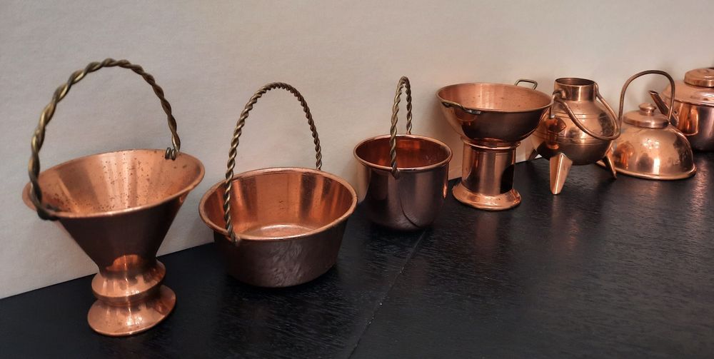 Conjunto de miniaturas em cobre