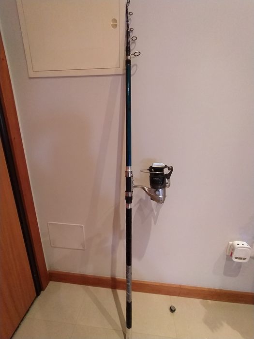 Cana surf ligeiro 4, 20m....50/100gr usada com carreto Okuma