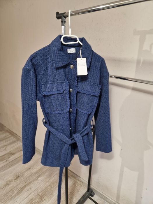 Nowy damski płaszcz