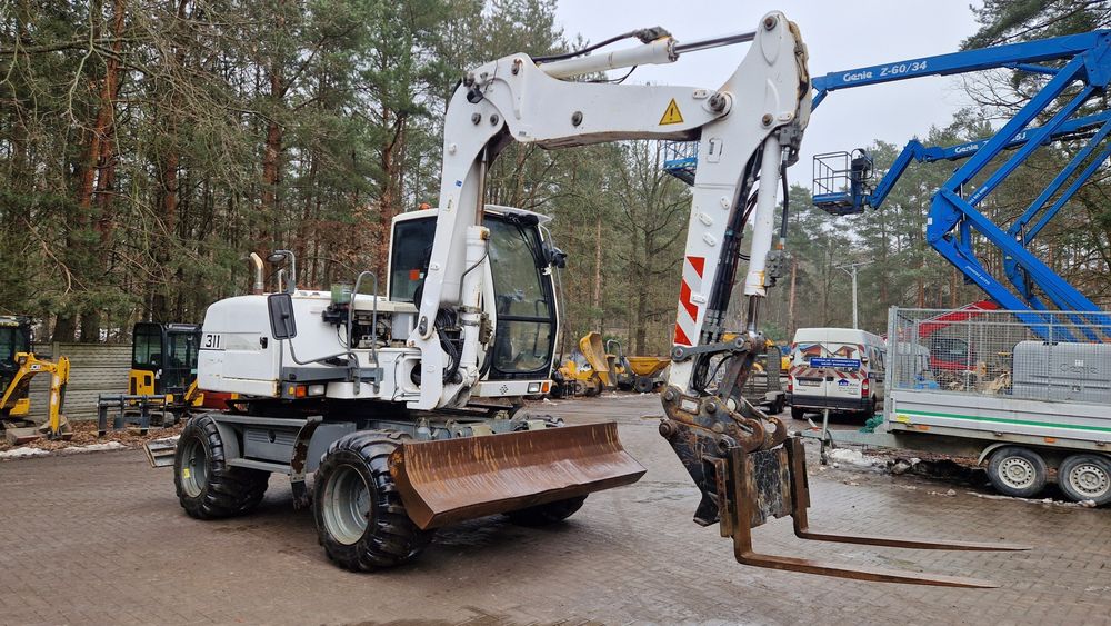 Koparka kołowa Liebherr 311 z 2012 roku 4 łyżki i widły