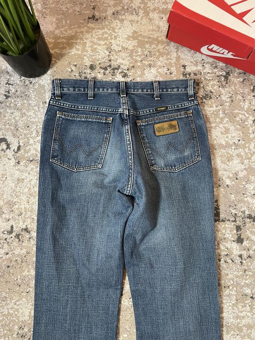 Spodnie jeansowe damskie dzwony wrangler W31L34