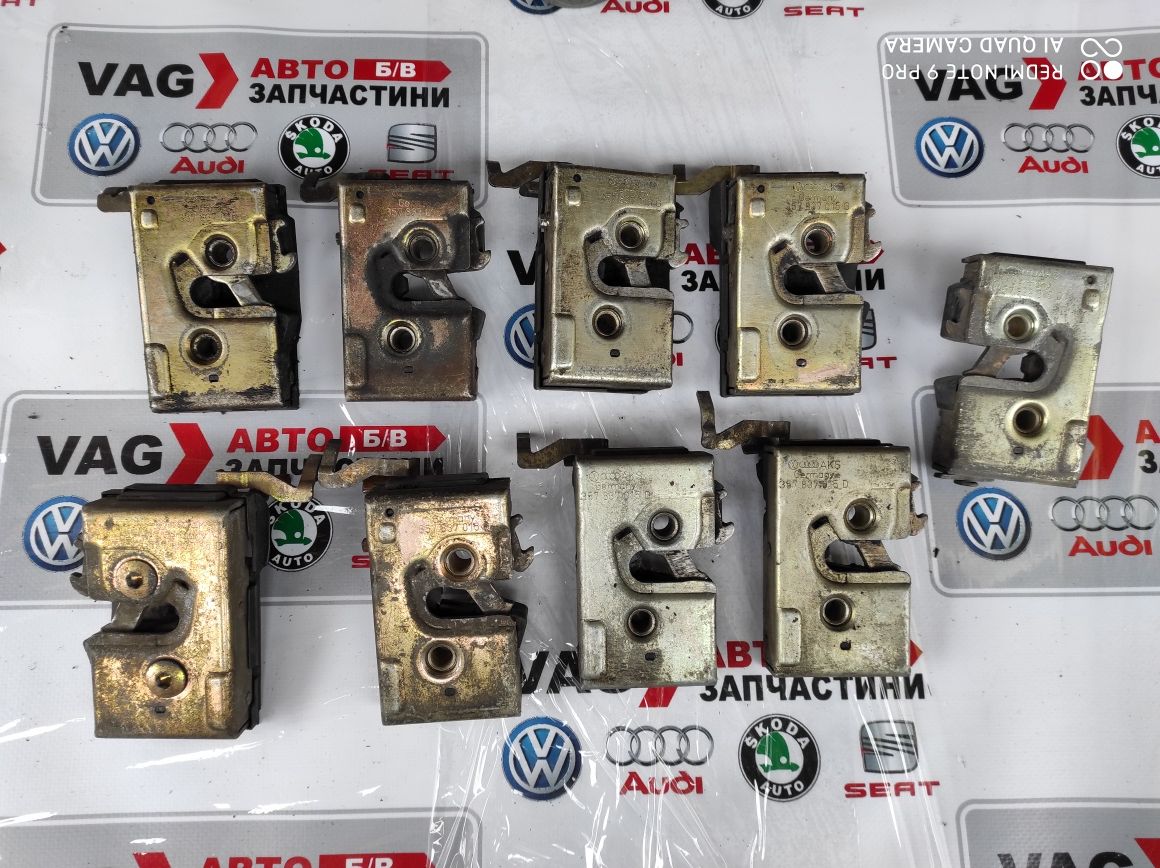Замок дверний б/в оригінал VAG VW Т-4,Пассат Б3,Б4,Гольф ,Поло,Сеат ...