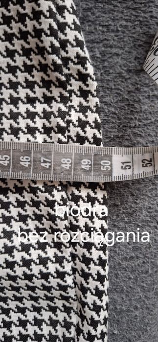 Spodnie w czarno białą pepitkę 44/46r