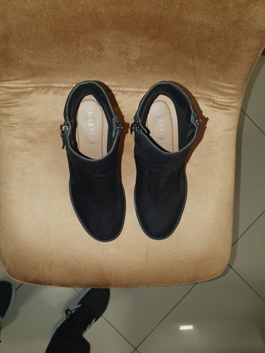 Botas pretas maria paz