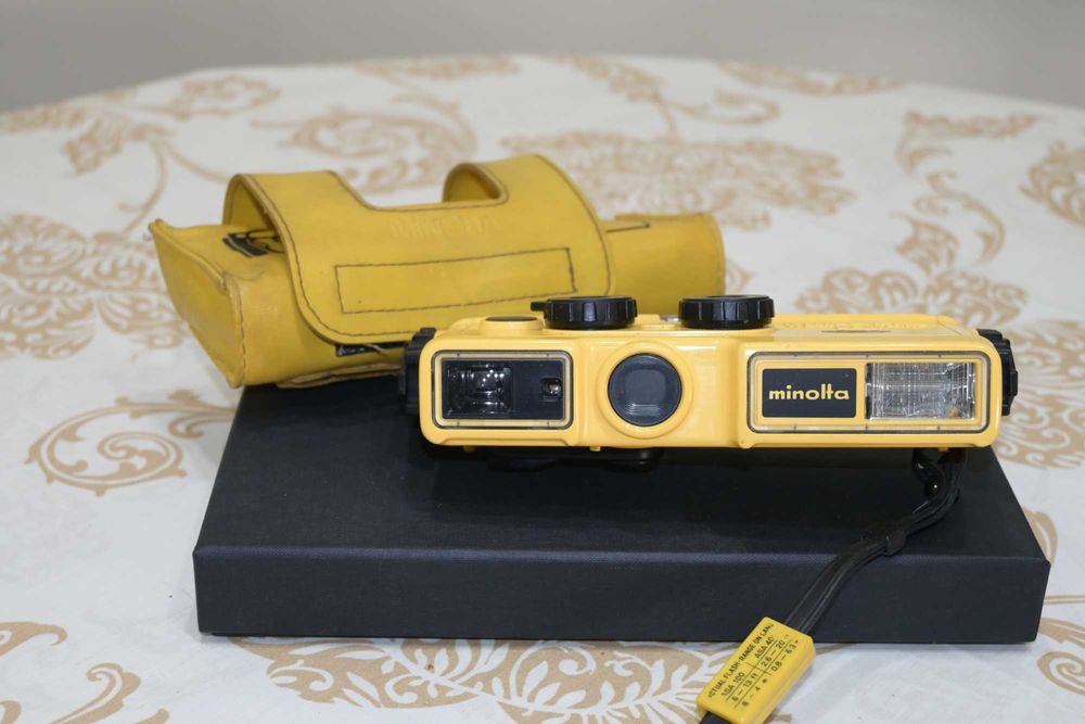Máquina de coleção Minolta Weathermatic