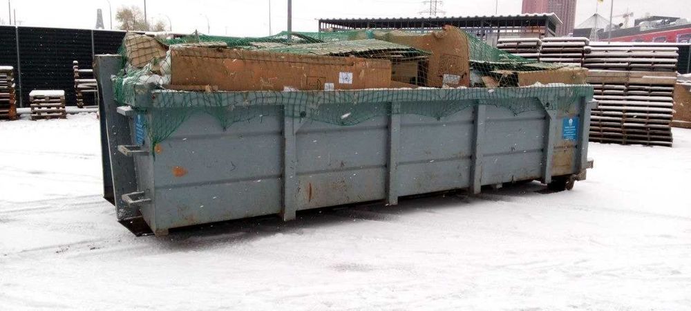 Вывоз строительного мусора контейнером Вивіз будівельного сміття