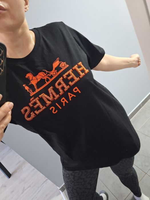 Koszulka czarna ,pomarańczowe napisy