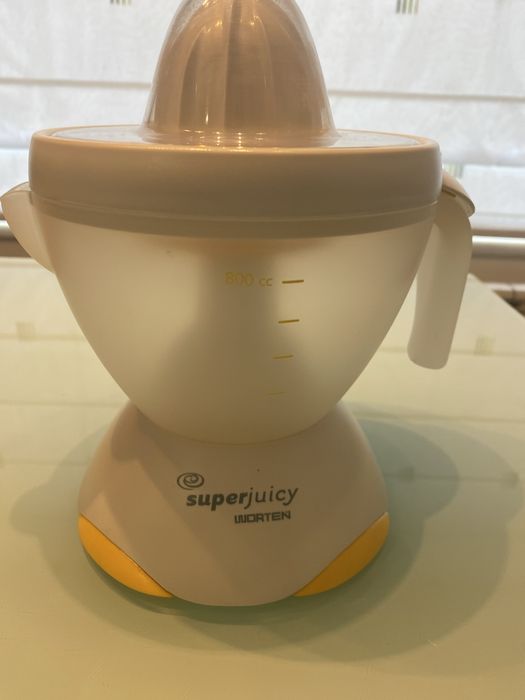 Espremedor de frutas eletrico