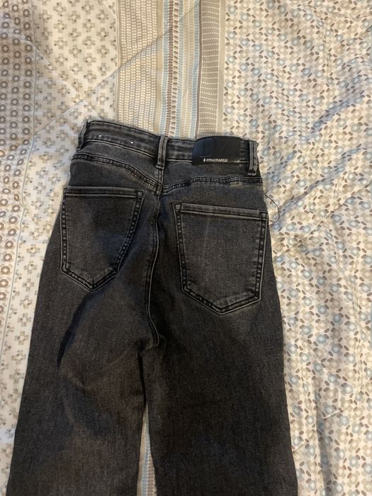 Calças boca de sino