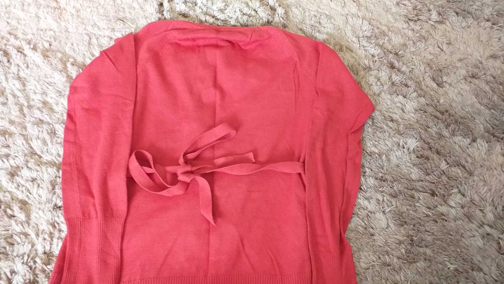 casaco de malha laranja