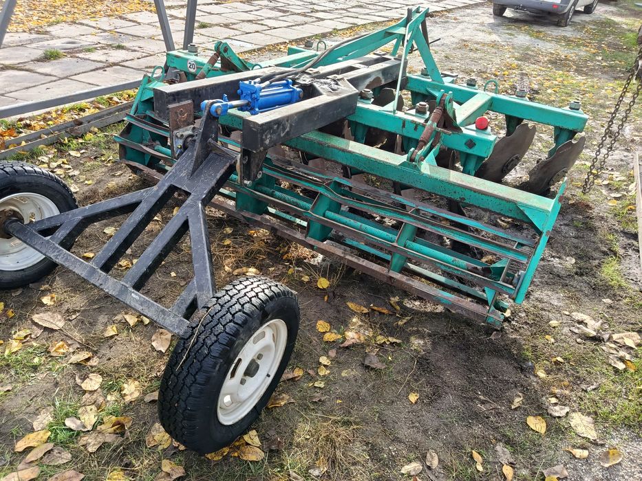 Причіпний пристрій для дискової борони