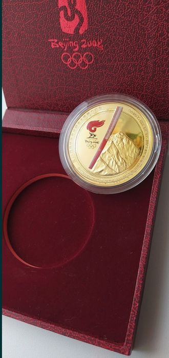 Настільна медаль 2008 року  . В честь запалення Олімпійського вогню.