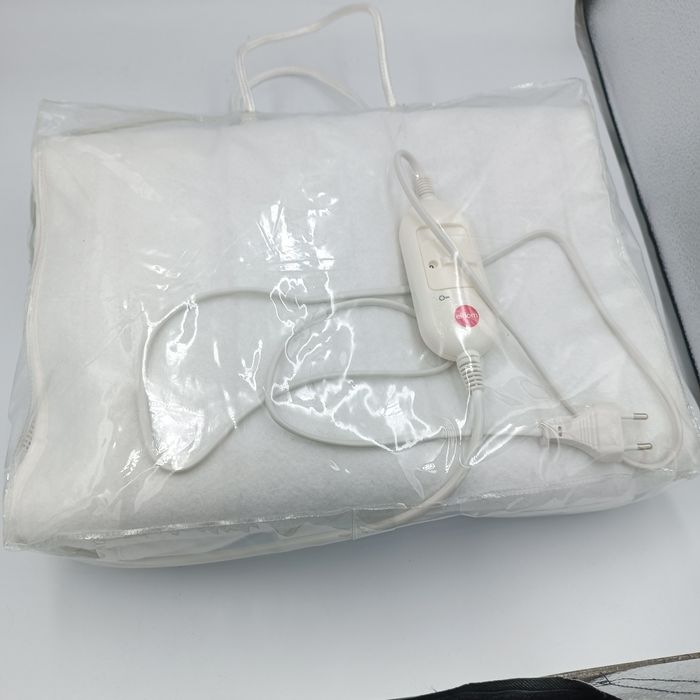 Koc grzewczy elektryczny na łóżko