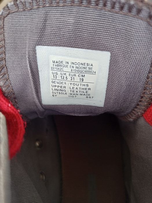 Sapatilhas Converse All Star em Pele
