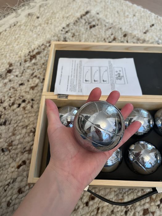 Boule metalowe w drewnianej skrzynce