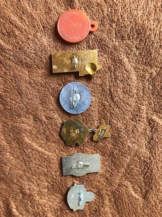 Значки різних років.