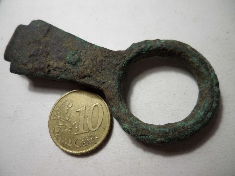 'Peça' antiga em Metal