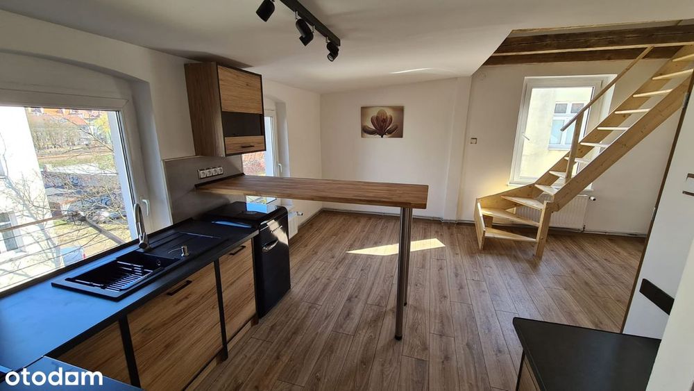 Loft na poddaszu w kameralnej kamienicy -bezpieczna inwestycja booking