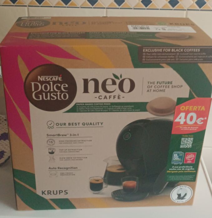 Máquina de café Neo nova em cor branca com caixa e vales de desconto para activar no valor de 40 euros por ex para compra de café
