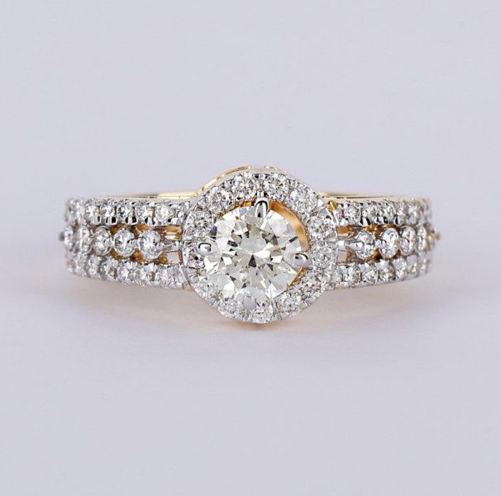 Okazały i  Elegancki Pierścionek z Złota 14k 585 wraz Diamentami Naturalnymi o łacznej masie kratowej  1,05 CT