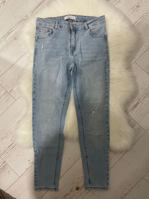 Niebieskie jeansy Reserved 40