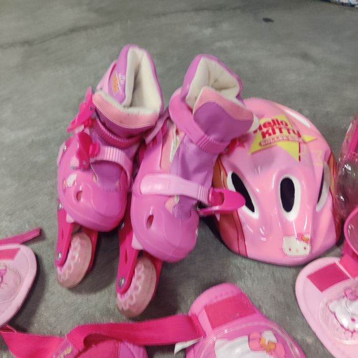 Conjunto patins em linha e proteção infantil