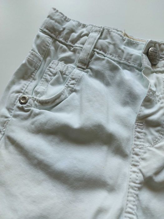 Dżinsy proste nogawki kieszenie guzik białe roz. 80