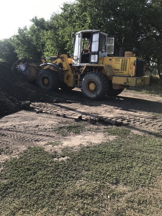 Погрузка автомобилей зерновоз,самосвал ,Услуги Фронтального погрузчика
