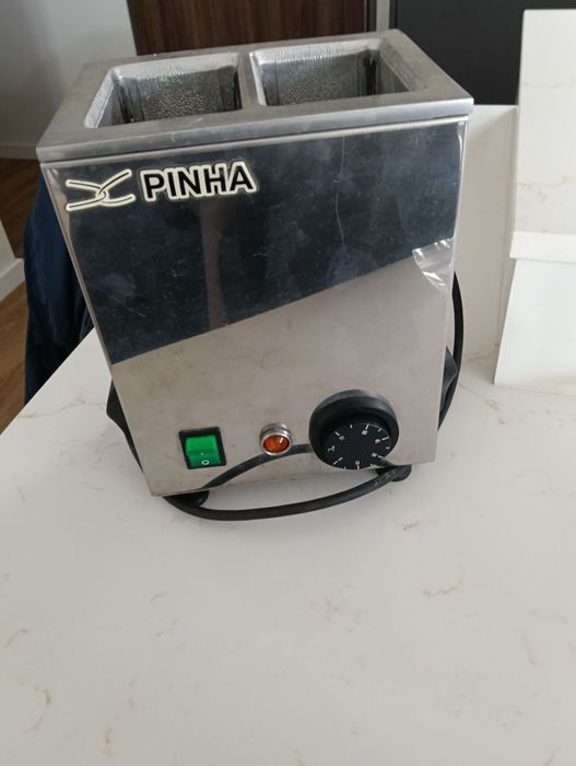 Aquecedor de pacotes de leite