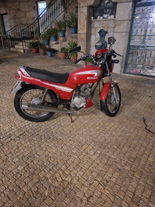 Mota 125 Sanyang   a trabalhar com documentos barata