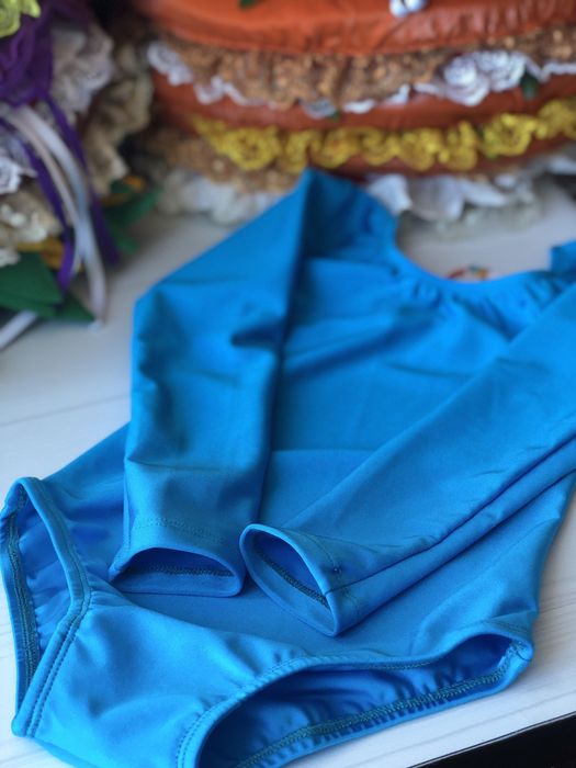 Шукаєте яскраве боді трико?  Для гімнастики, танців. Різні  кольори!