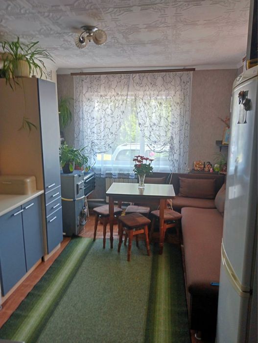 Продам квартиру двоповерхову,гараж,погріб,город