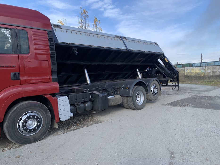 Ман самоскид з маніпулятором