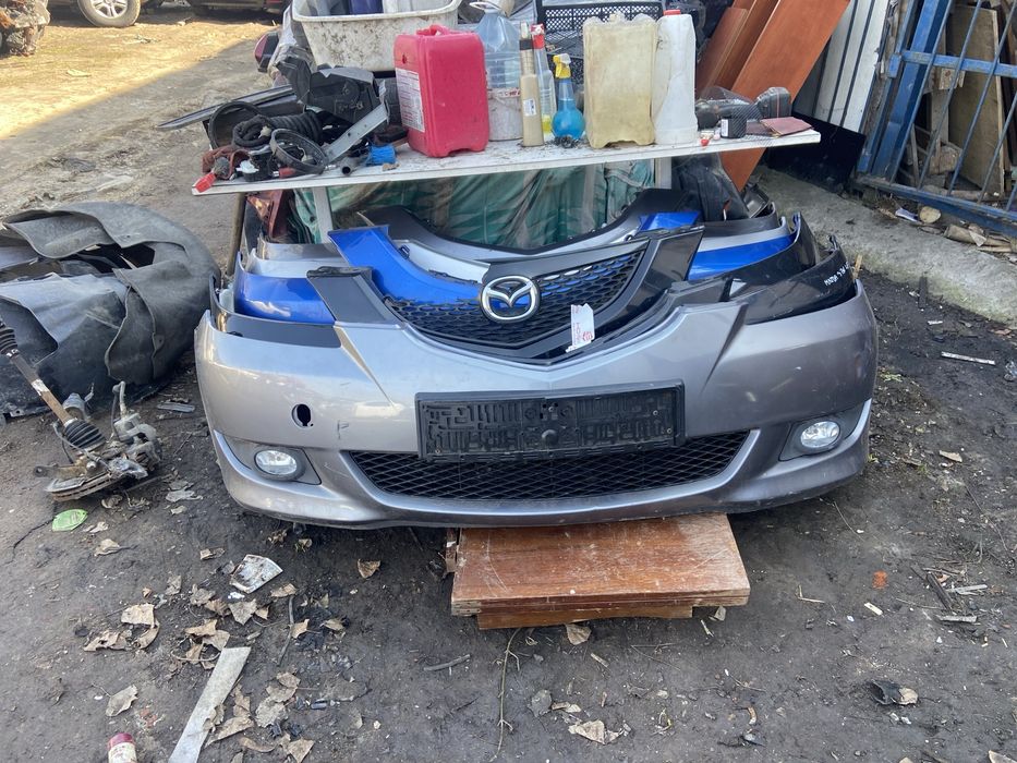 Передний бампер мазда 3бк телевизор уселитель капот