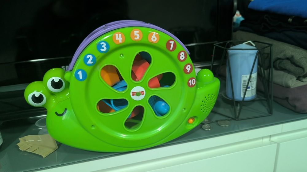 Ślimak Fischer Price muzyczny