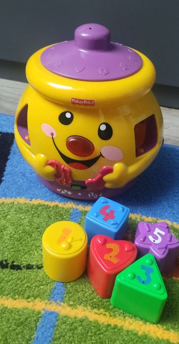 Garnuszek na klocuszek marki Fisher Price Dla dziecka