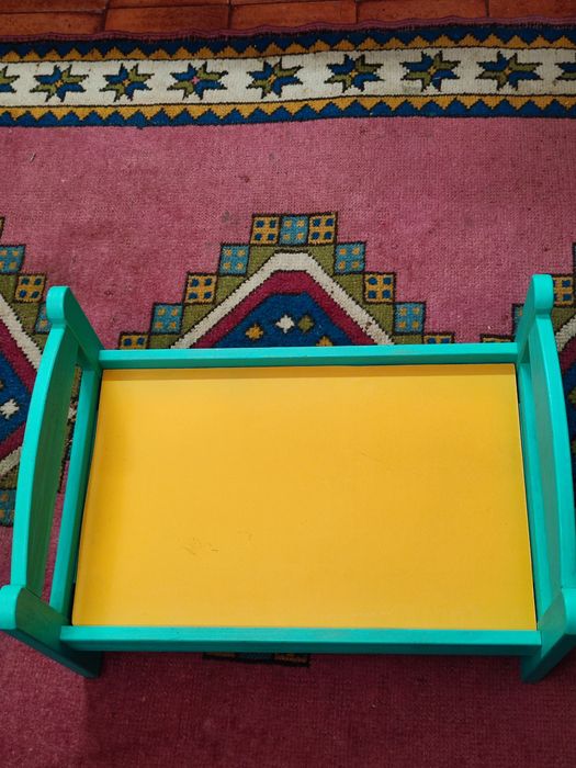 Cama para bonecas