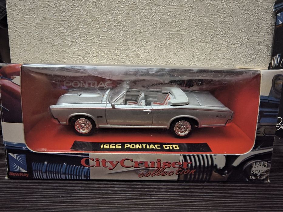 Модель авто Pontiac GTO 1966. New Ray.