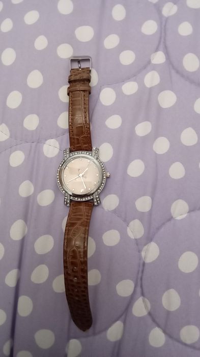 Relógio castanho homem