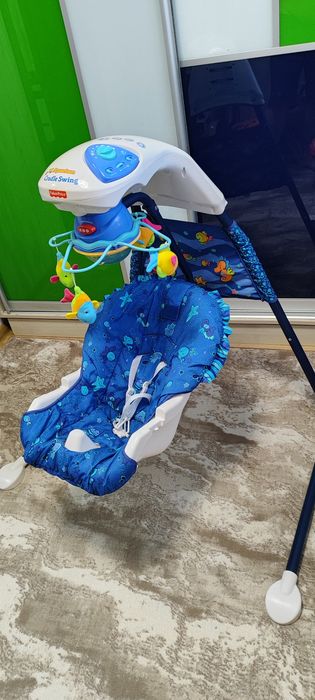 Качеля-гойдалка Fisher-Price.