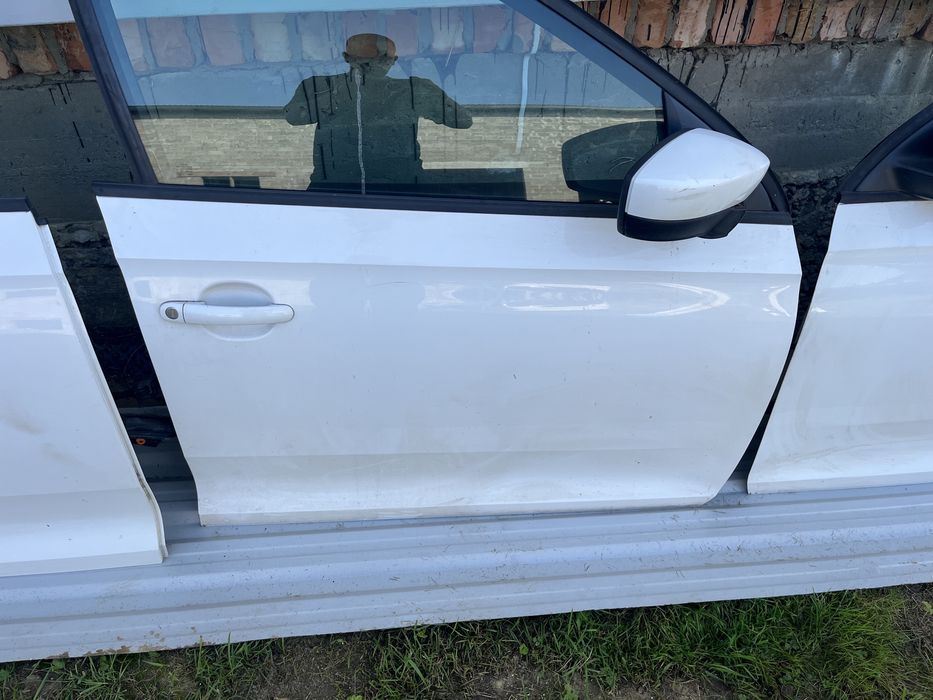 Двері шкода Рапід Skoda Rapid