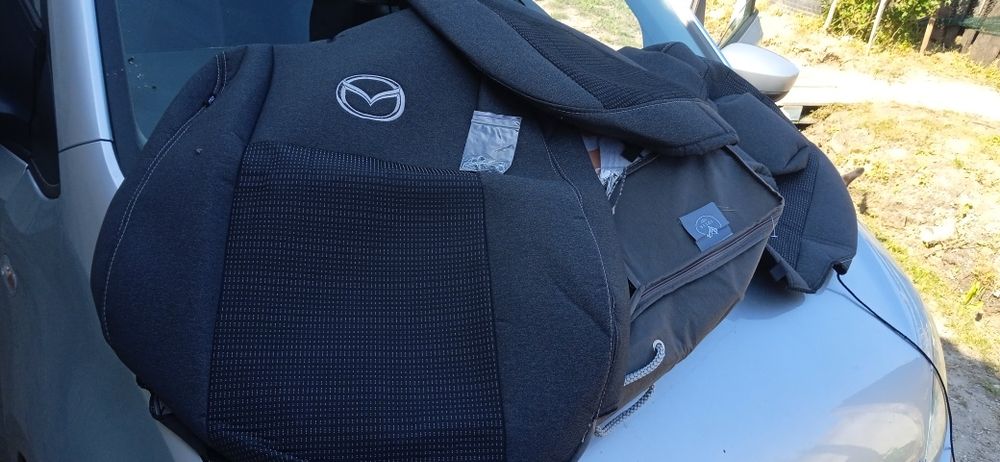 Чохли оригінальні мазда 3