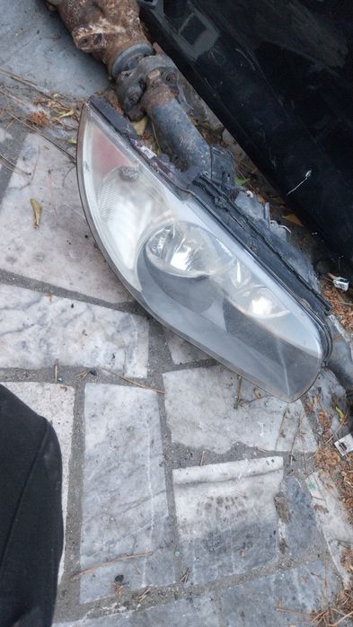 Farol direito bmw E81 2008