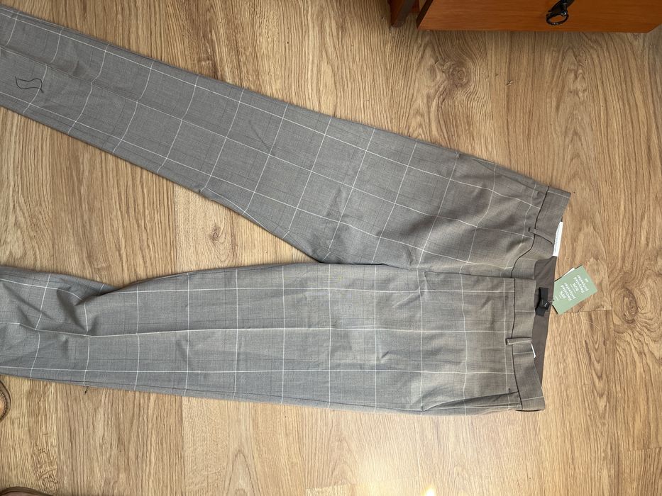 Spodnie eleganckie meskie rozmiar 32 nowe z metka