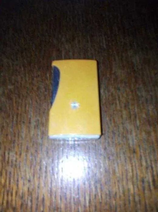 Zapalniczka kolekcjonerska na kamień.