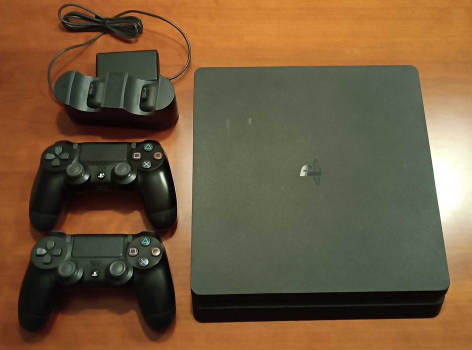 PlayStation 4 (PS4) Console with 2 Controllers, Charger, and 4 Games64309592920194122