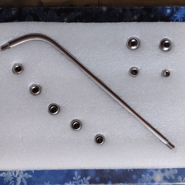 Инструмент для выравнивания вмятин на саксофоне.